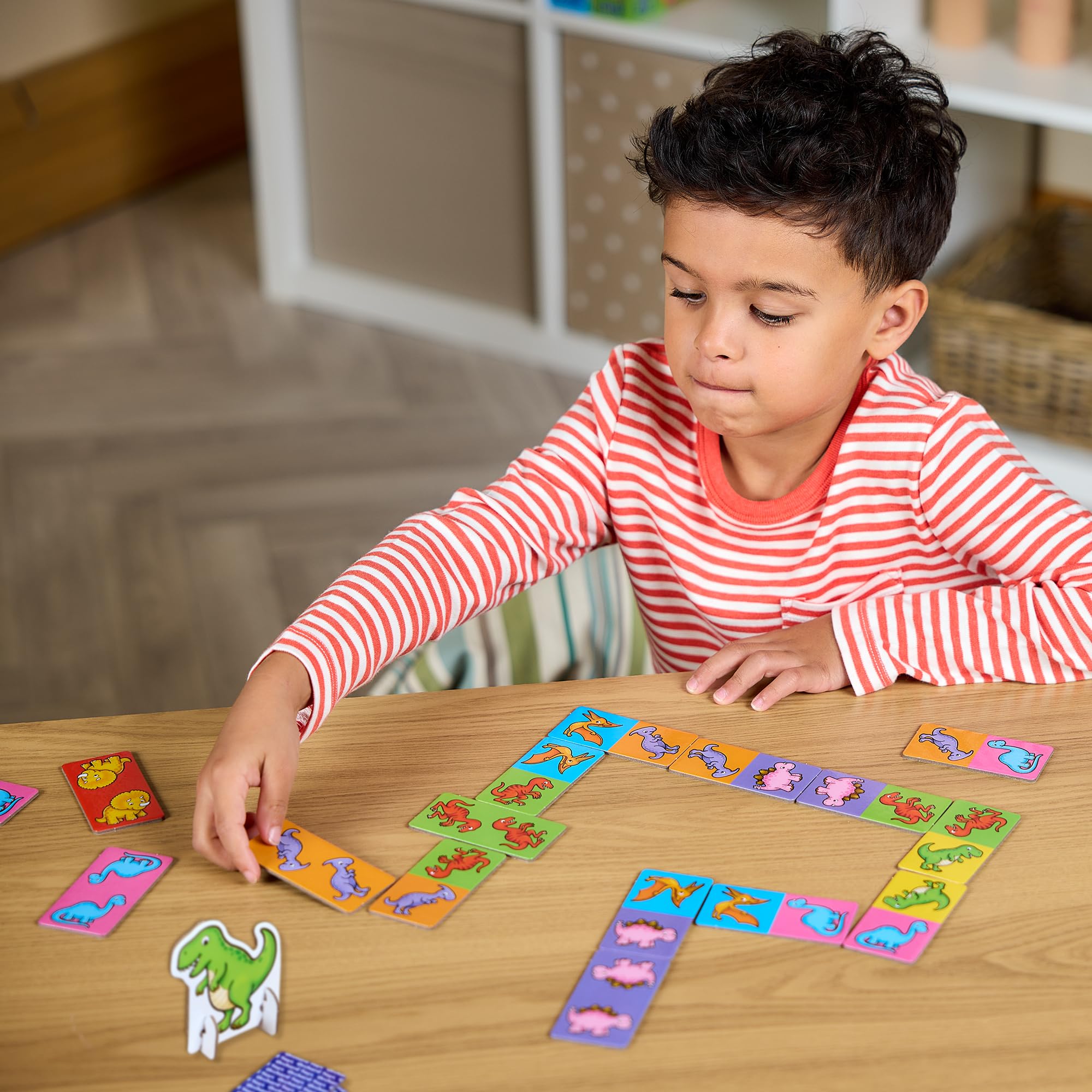 Orchard Toys Dinosaur Dominoes Mini Game, Compact Travel Dominoes for Kids 4